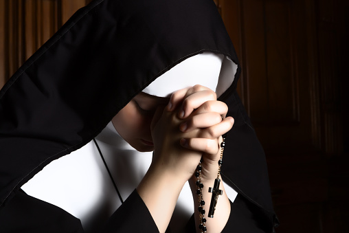 Nun in prayer