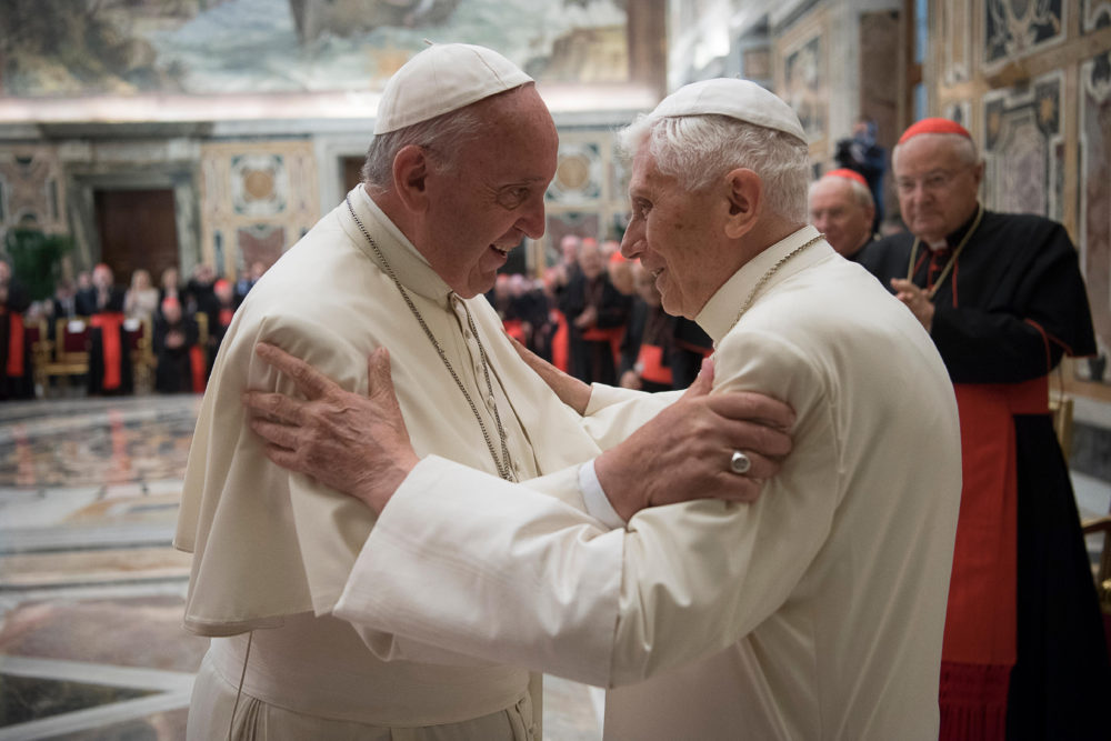 Pope Francis greets retired Pope Benedict XVI during a June 28 ceremony at the Vatican marking the 65th anniversary of the retired pope's priestly ordination. (CNS photo/L'Osservatore Romano, handout) See POPE-BENEDICT-ANNIVERSARY June 28, 2016.