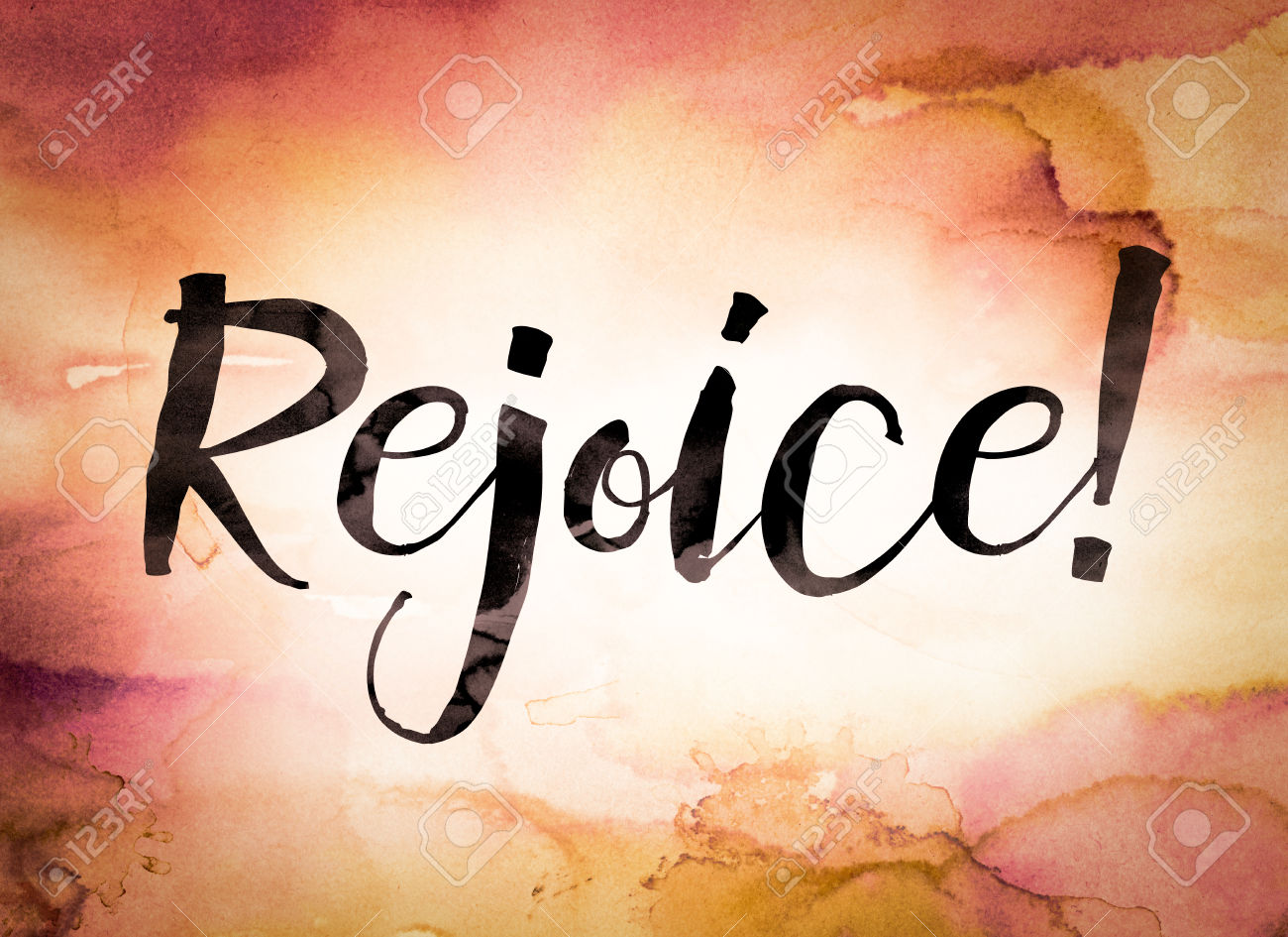 The word "Rejoice" written in black paint on a colorful watercolor washed background.